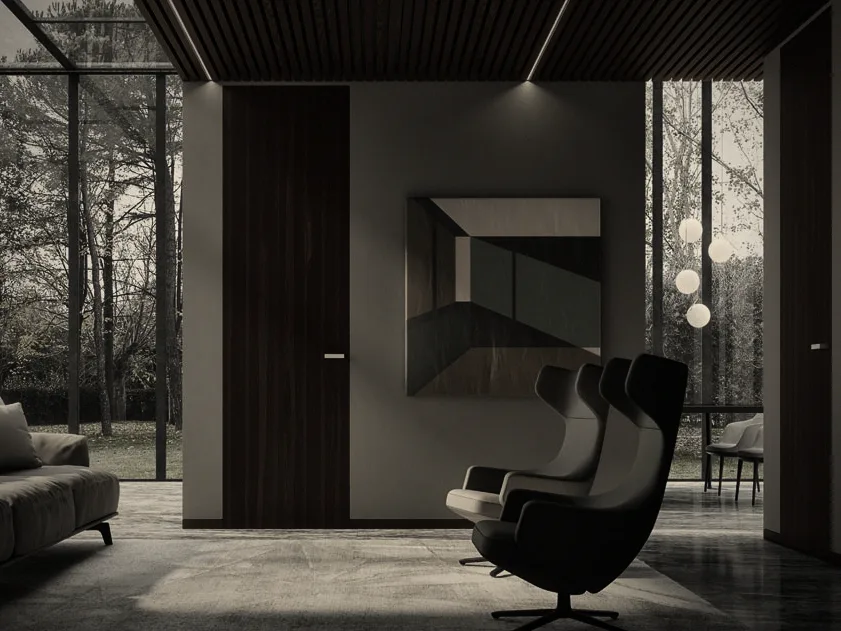 Concealed door in a veneered wall panel
